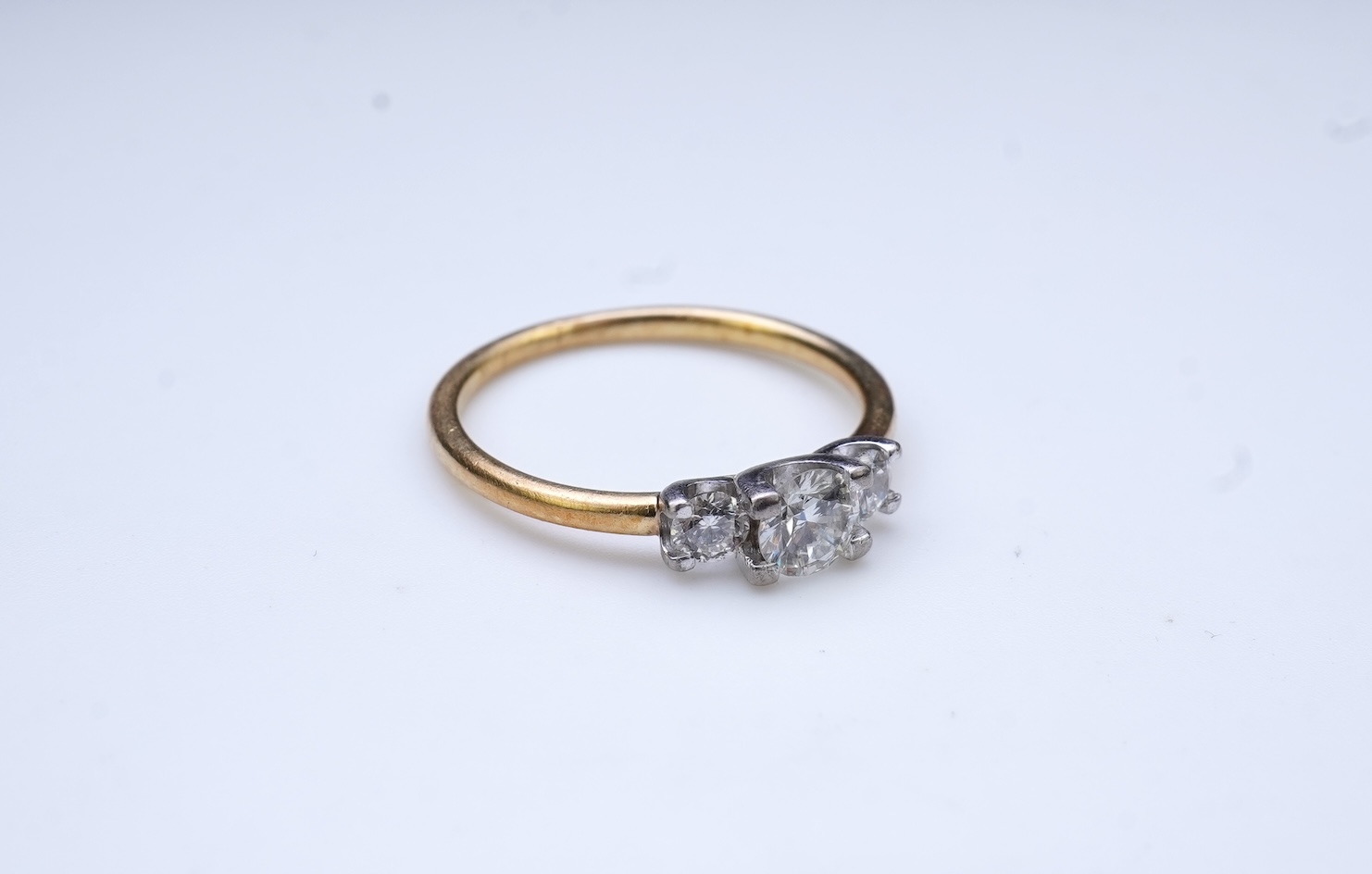 A three-stone diamond ring